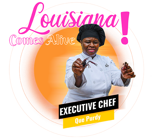 Executive Chef Que Purdy holding crawfish
